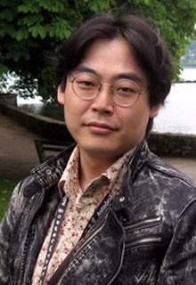 Кимитоси Тиока 